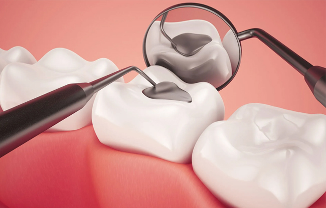 Dental magnifying glass examining white tooth models on coral pink surface.